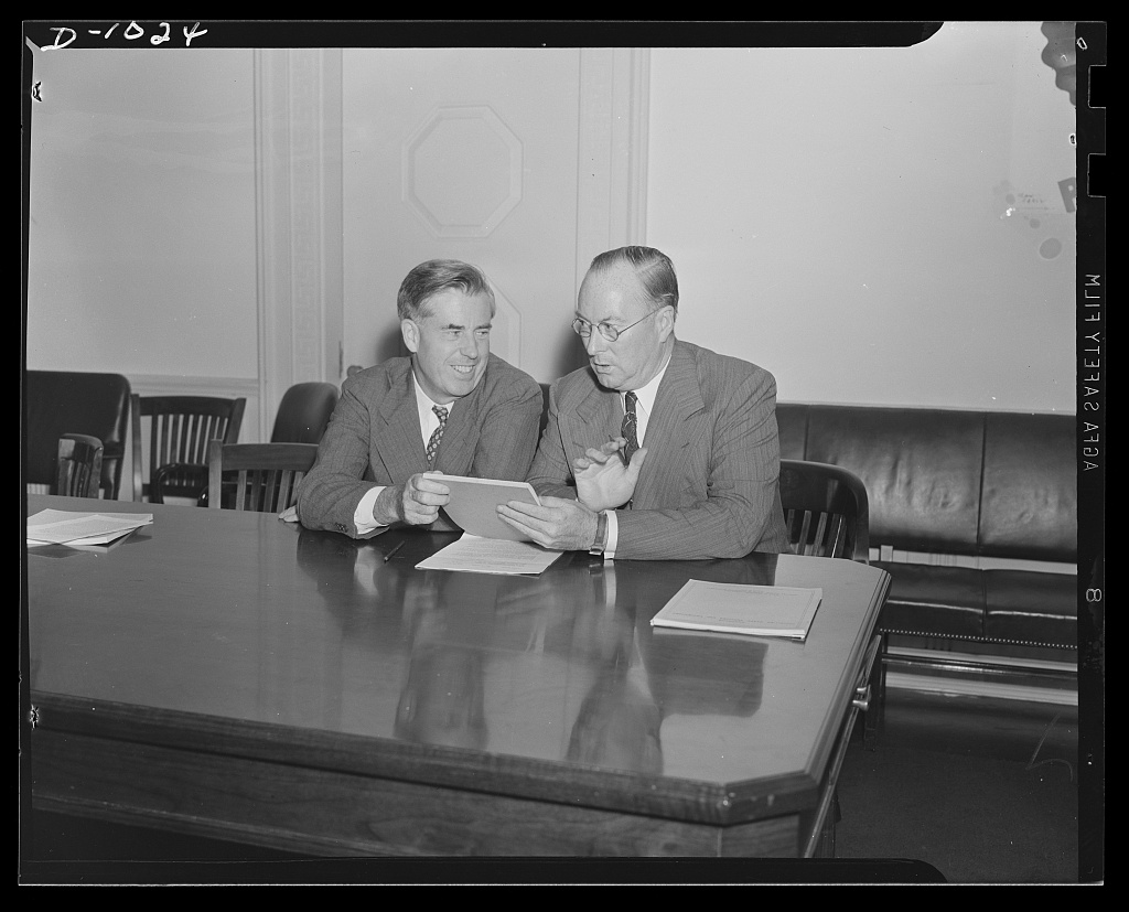 Government officials at a joint press conference following a war production board meeting